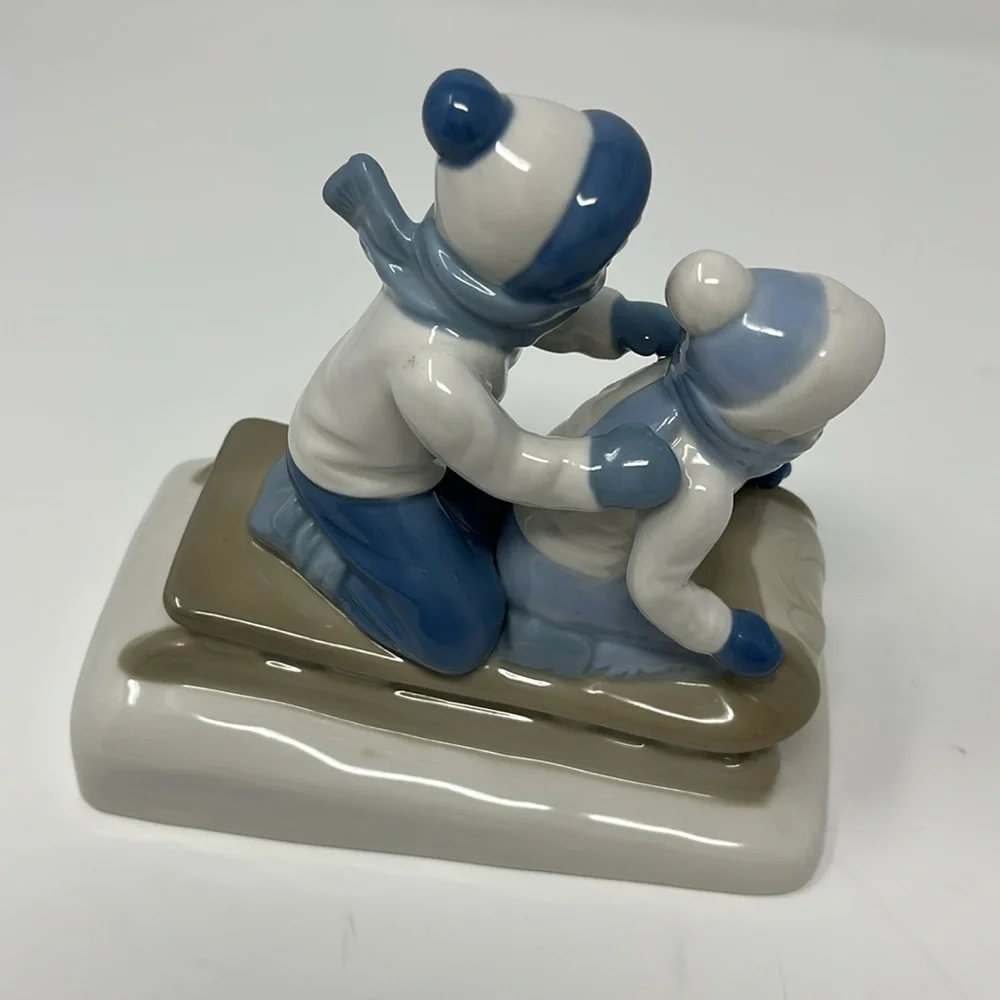 Porcelana De Cuernavaca Mexico Sledding Children Figurine